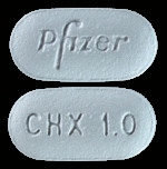 Picture of both sides of Pfizer's varenicline or Chantix pills.
