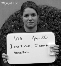 Iris, a smoking college student, holding up a sign that reads 'Iris age 20, I can't run and I can't breath' 