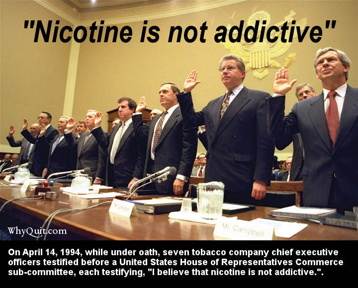 Photo of 7 tobacco company CEOs being sworn in before testifying before a U.S. House committee on April 14, 1994 that nicotine is not addictive.