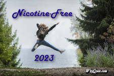 A backside view of a girl wearing a backpack jumping for joy in the woods captioned nicotine-free 2023.