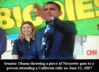 Senator Obama throwing a piece of Nicotine gum to a person attending a June 12, 2007 California rally