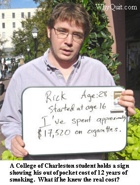 Rick, a College of Charleston student, holds a sign upon which he has written, Rick, age 28, started at age 16, I've spent approximately $17,500 on cigarettes.  What if Rick knew the real cost?